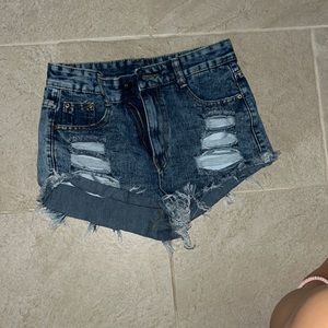 small ripped short jeans